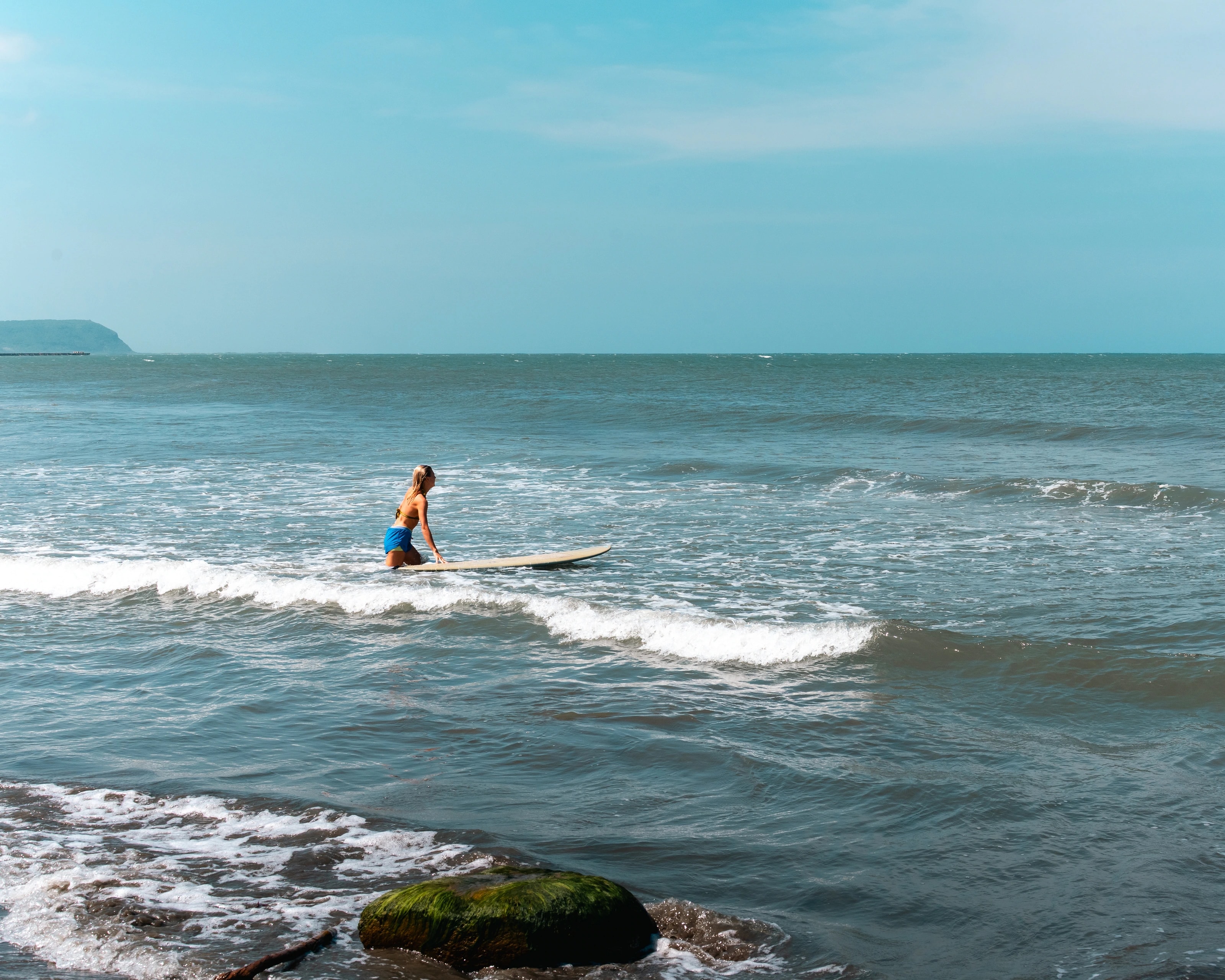 A surfer on a breaking wave