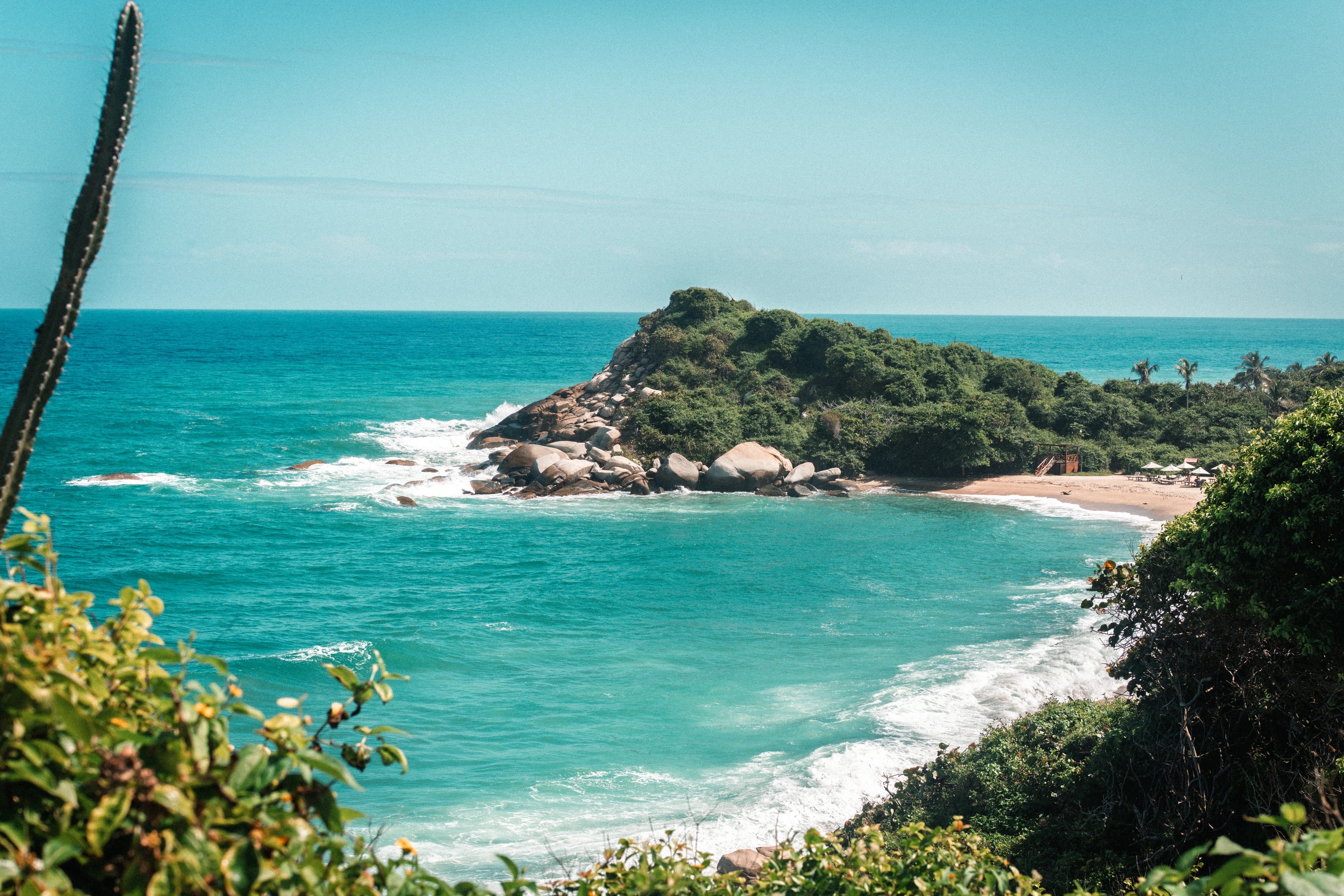 A rocky island surrounded by turquoise water
