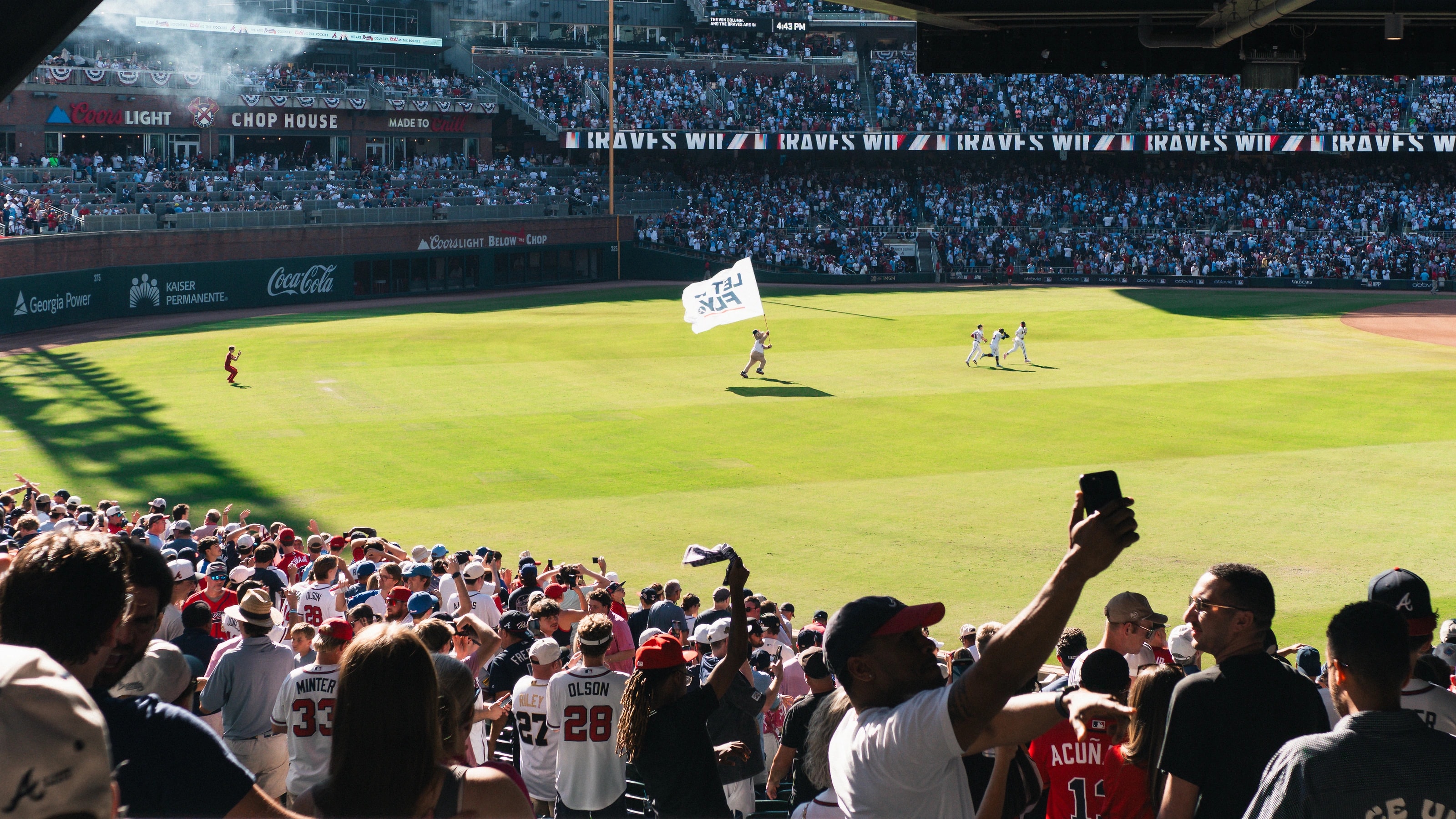 Spectators watching a baseball game